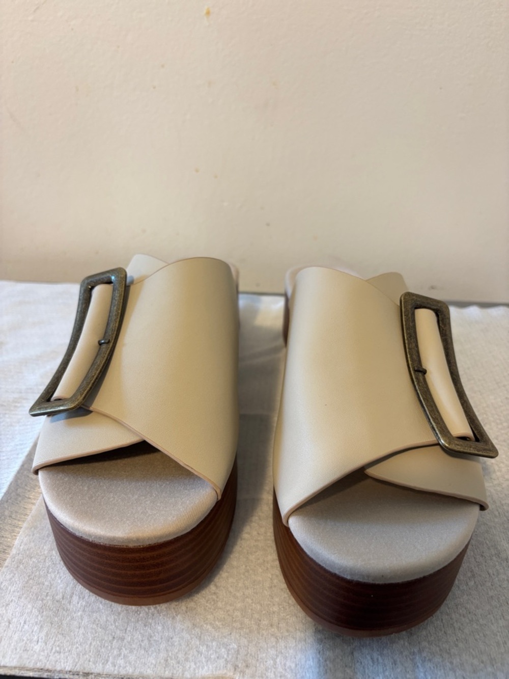Kelsi Dagger Cream Slide Mules with Antiqued Buckle